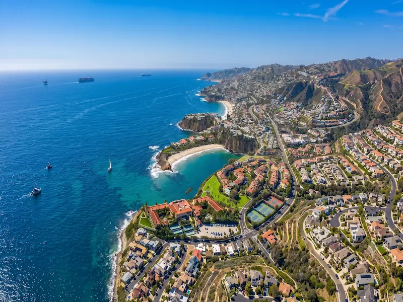 Aerial view of Dana Point coastline and homes in South Orange County
